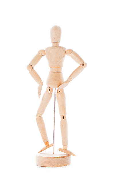 istock Wooden figure mannequin 521504354