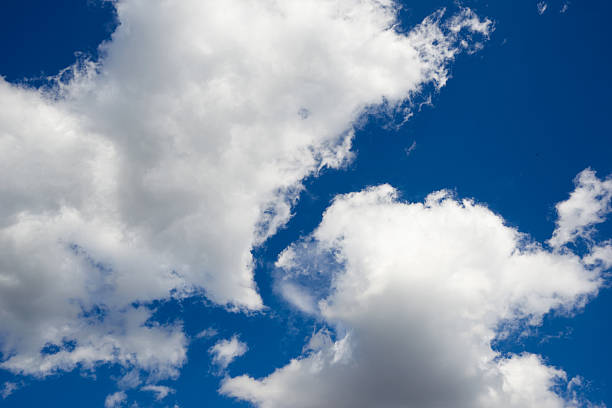 istock beautiful blue sky with white clouds clouse up 521505674