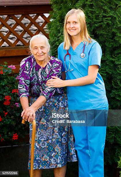 On A Walk In The Garden Stock Photo - Download Image Now - Adult, Alzheimer's Disease, Assistance