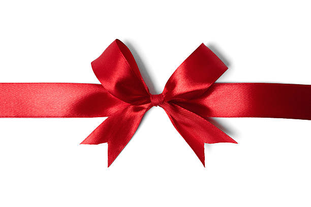 istock Shiny red satin ribbon on white background 521513481