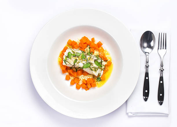 istock Seafood with pumpkin garnish. White diet  fish 521513655
