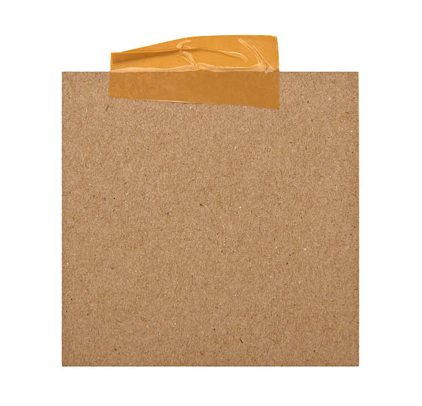 istock close up of a brown note paper on white background 521514897