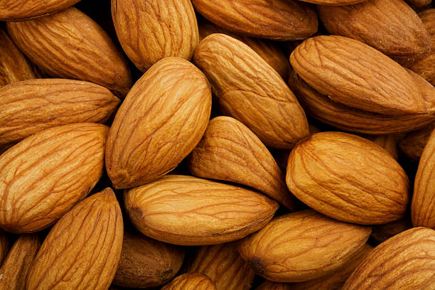istock Closeup of whole almond nuts 521515461