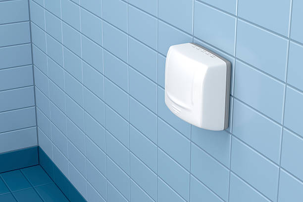 istock Hand dryer in public toilet 521516973