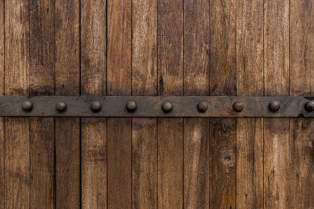Metal on old wooden background for design stock photo