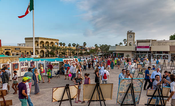 San Jose, Mexico - April 26/ 2016: Artists display there artwork in the main square of town which is a popular draw for tourists and locals alike.