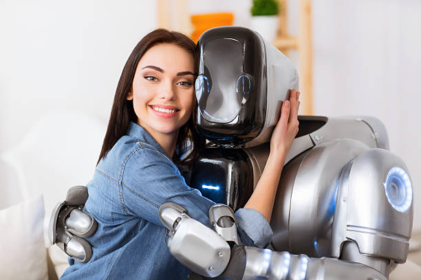 istock Nice girl and robot embracing 521532900
