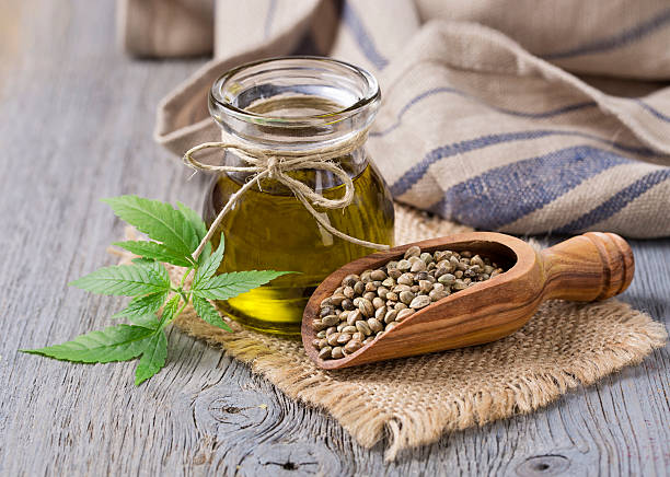 istock Hemp oil n a glass jar 521534856