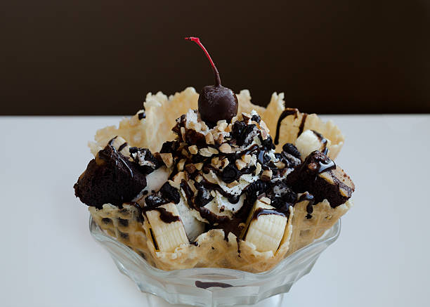 istock Ice Cream Sundae in waffle bowl with brownies, almonds 521535112