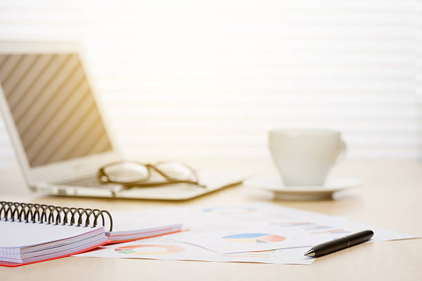 istock Office desk workplace with laptop and coffee 521535280