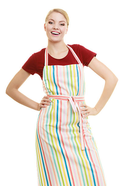 istock Smiling housewife in kitchen apron 521535464