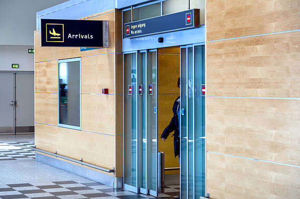 istock Airport arrival doors 521537338