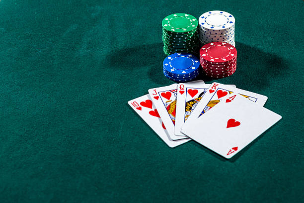 istock Poker play. Chips and cards 521538418
