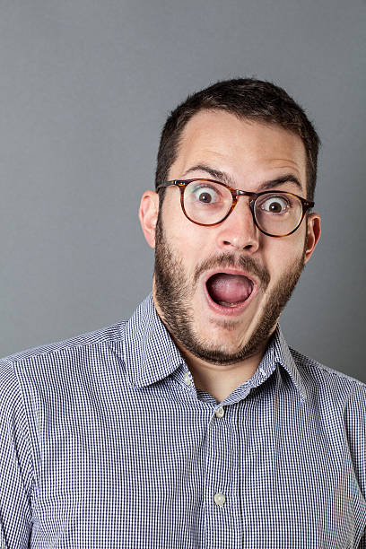 istock surprise concept for happy young corporate man with mouth open 521540496