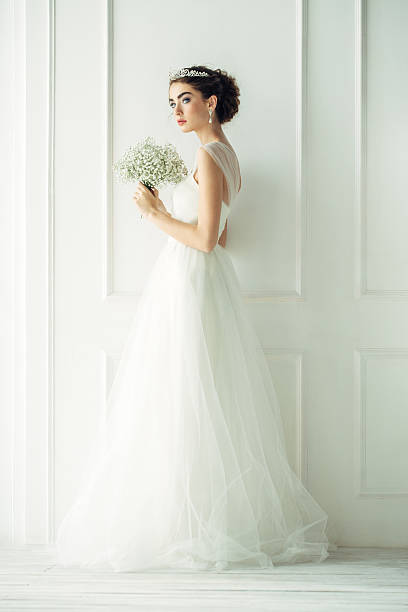 istock Studio shot of young beautiful bride 521542104