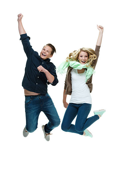 istock Couple jumping in the air 521542388