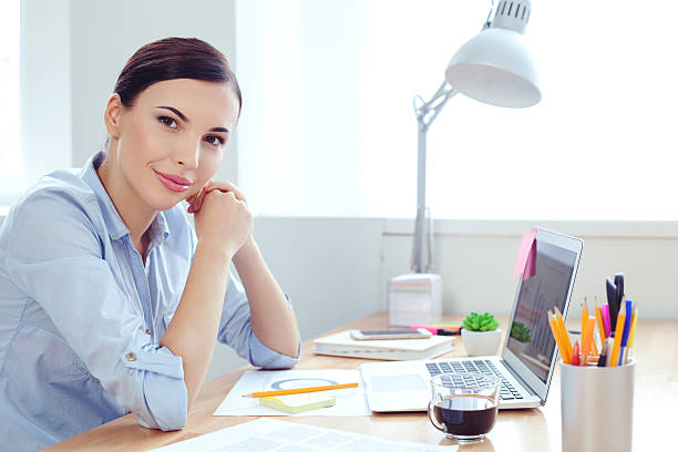 istock Attractive young businesswoman is doing her work 521542502