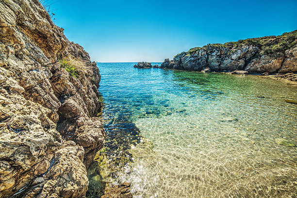 istock rocks and turquoise water in Sardinia 521542508