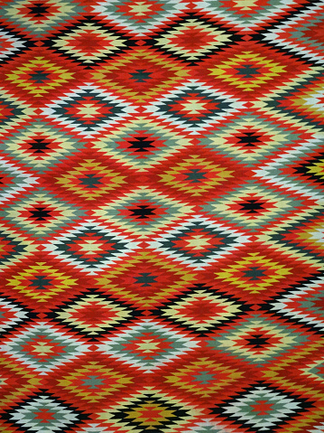 Pattern Red, Orange, White, Green, Black, and blue Diamond Blanket/ Rug - Navajo Artist, made about 1885 of cotton and wool.