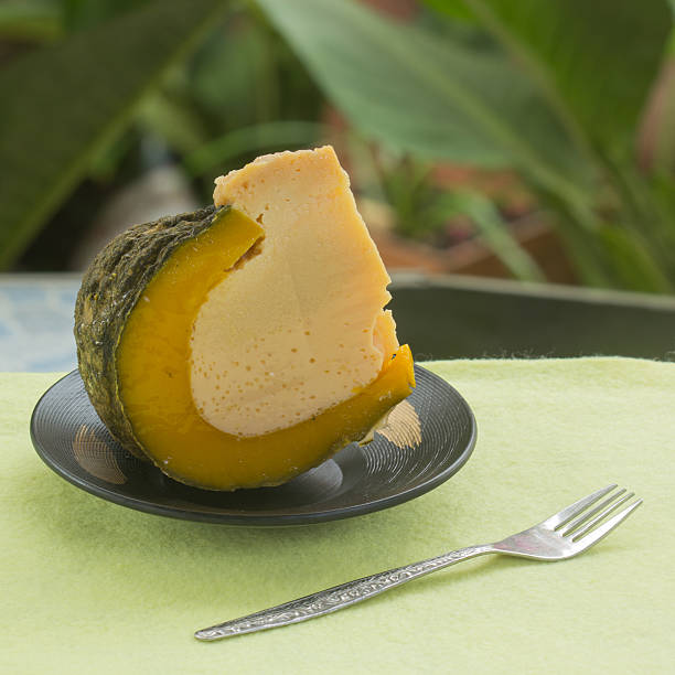 istock Half of Egg Custard in the pumpkin 521544456