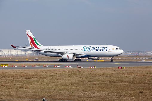 Frankfurt, Germany - March 18, 2016: The SriLankan Airlines Airbus A330-343 with identification 4R-ALP takes off at Frankfurt International Airport (Germany, FRA) on March 18, 2016.