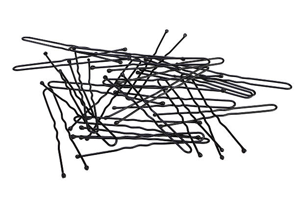 istock Black hairpins on white background 521546526