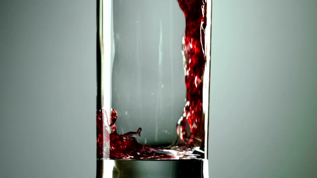 wine, grape juice is poured into a glass