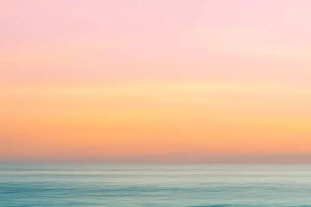 Photo of Abstract sunrise sky and  ocean nature background