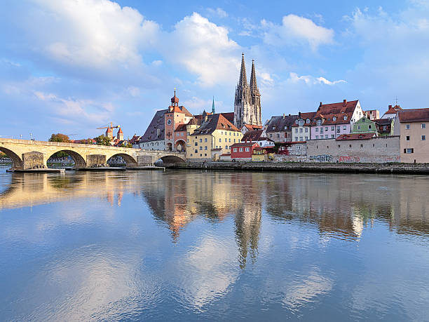 istock Regensburg Cathedral and Stone Bridge over Danube, Germany 521577483