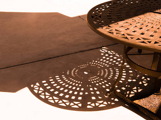 istock Metal Patio Table and Cast shadow 521578415