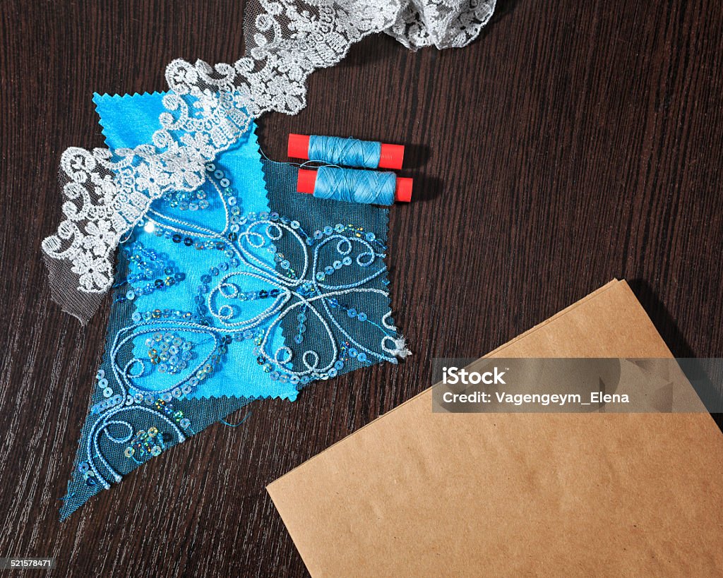 Instruments fashion designer clothing Tools trendy designer clothing paper and yarn Arrangement Stock Photo