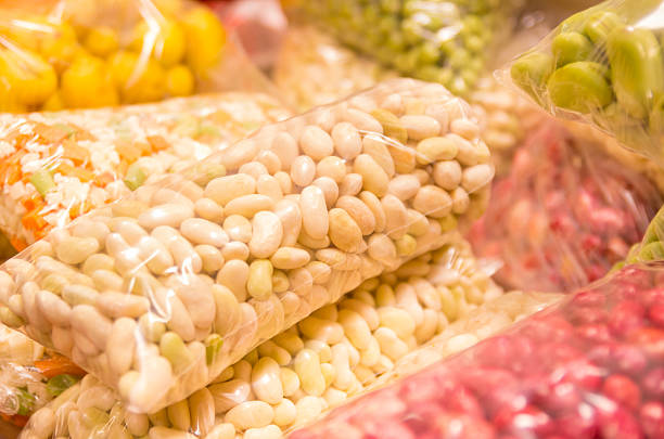 white beans in plastic bag at the market selective focus