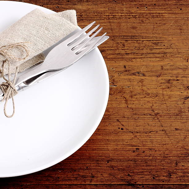 istock Seasonal white wooden table with cutlery 521603006