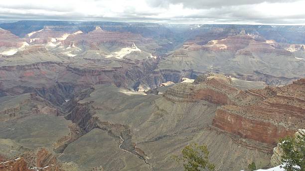 istock Cloudy Grand Canyon South Rim in Winter 521603120