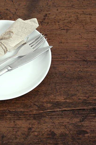 istock Seasonal white wooden table with cutlery 521603708