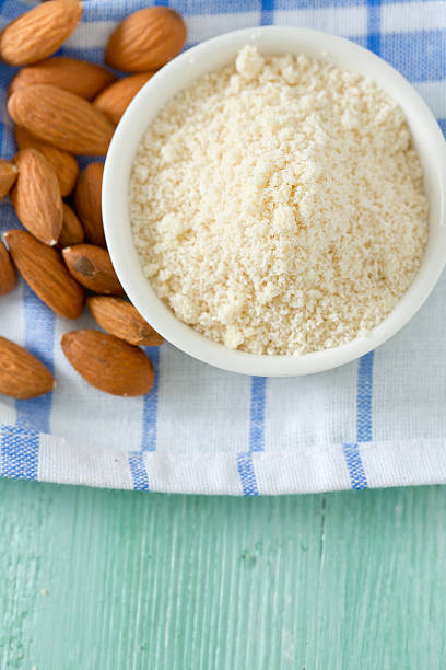 istock almond flour on wooden surface 521604034