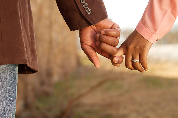commitment Couple holding hands engagement ring stock pictures, royalty-free photos & images