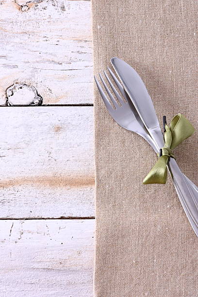 istock Seasonal white wooden table with cutlery 521604582