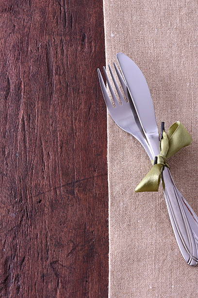 istock Seasonal white wooden table with cutlery 521604706