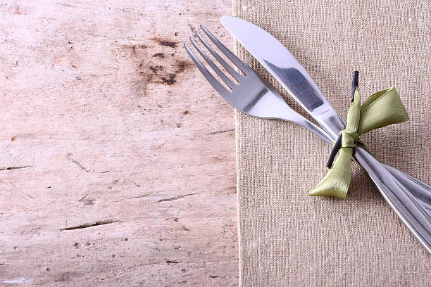 istock Seasonal white wooden table with cutlery 521605278