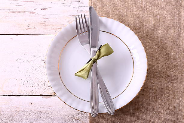 istock Seasonal white wooden table with cutlery 521605456
