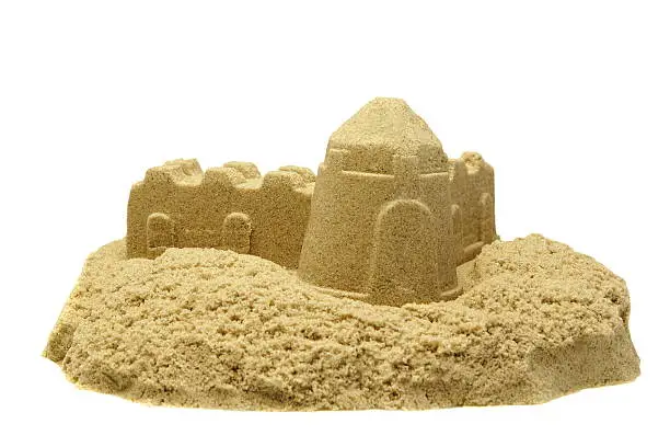 Single Sand Castle Made From Kinetic Sand or Magic Sand Isolated On White Background, Concept for Indoor Children Activity, Front View, Close Up