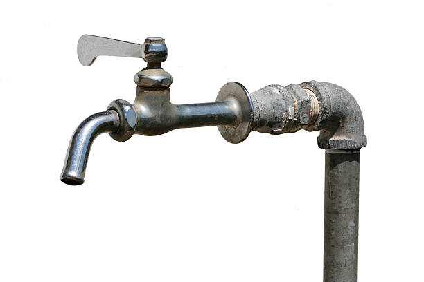 istock Old metal faucet  isolated on white background. 521607136
