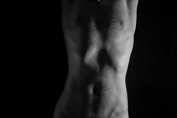 istock Naked torso of young man 521611676