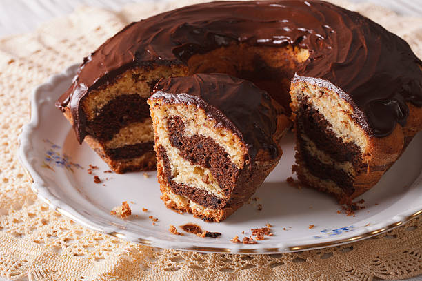 istock marble cake with chocolate cut on a plate. horizontal 521611872