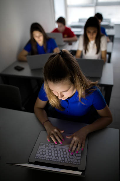 istock Above view of high school student in a computer lab. 521614096