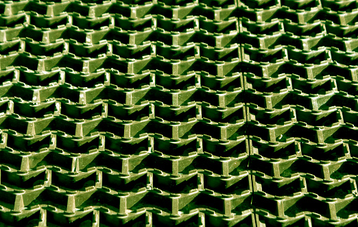 Plastic green floor cover texture. Background and texture