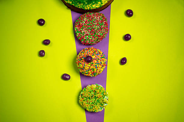 multicolored easter gingerbread cakes, sugar candies, bright  background, celebration photography