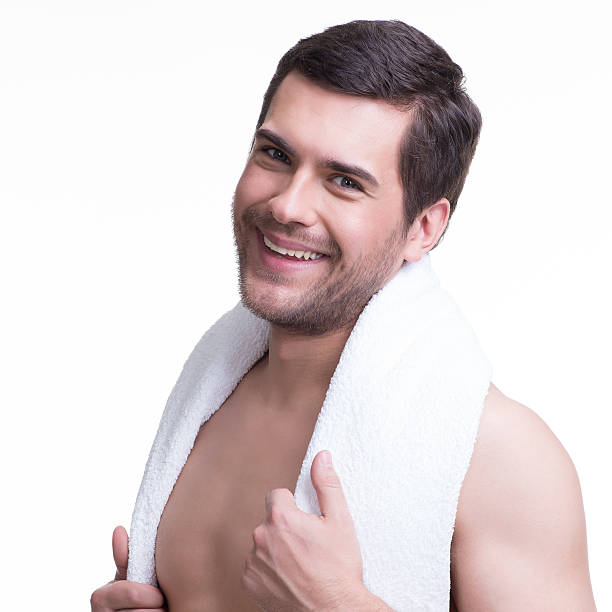 istock Portrait of handsome smiling young man 521616930