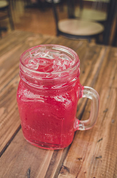 istock Strawberry italian soda on wood table 521616978